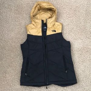 Black and gold Northface women’s vest